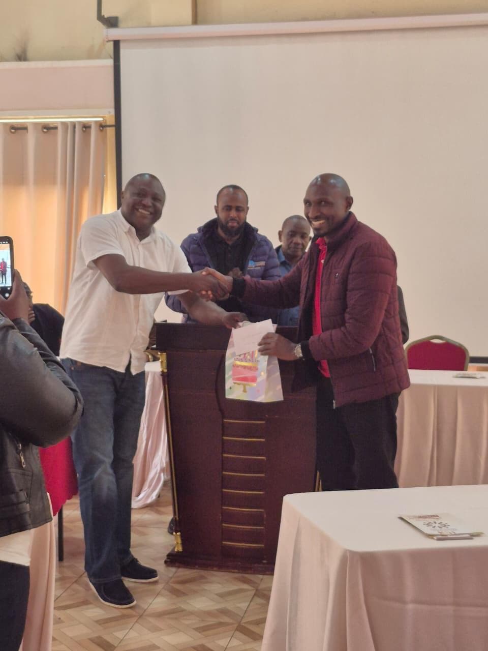 OMA electric bus and passengers in Nairobi