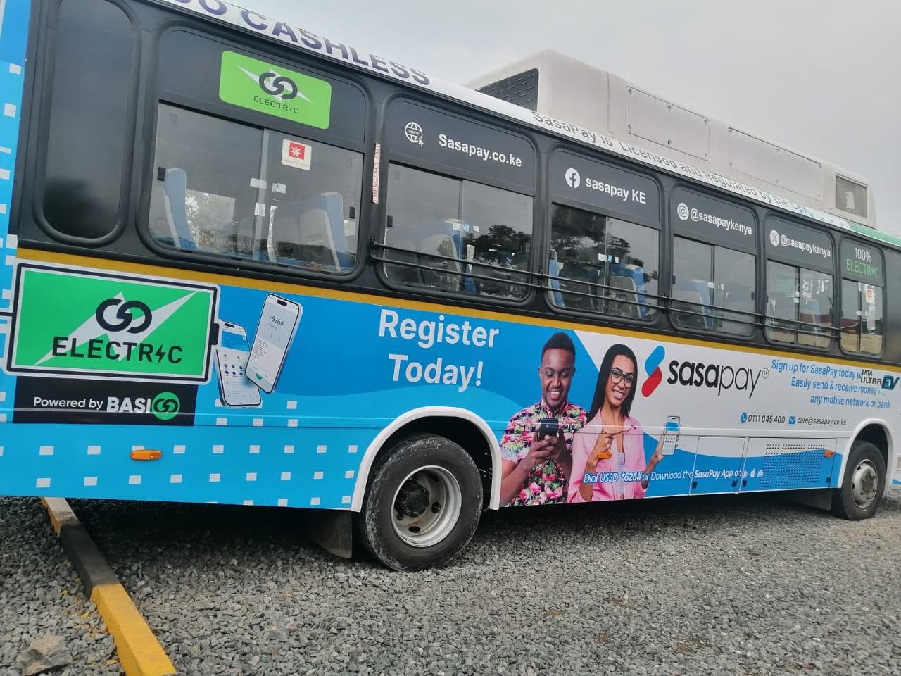 Passengers boarding OMA electric bus